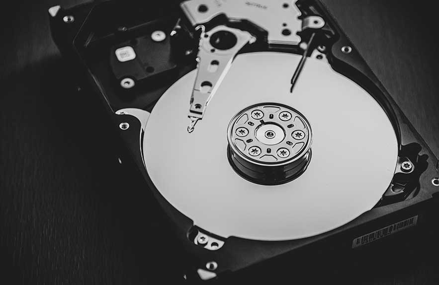 close-up photo of hdd platter showing internal structure of storage devices for computers